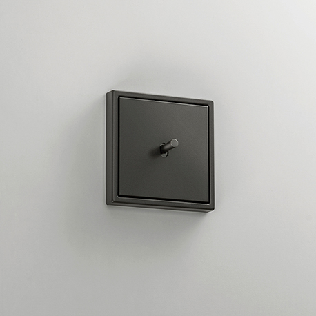 JUNG LS 1912 toggle switch in dark aluminium